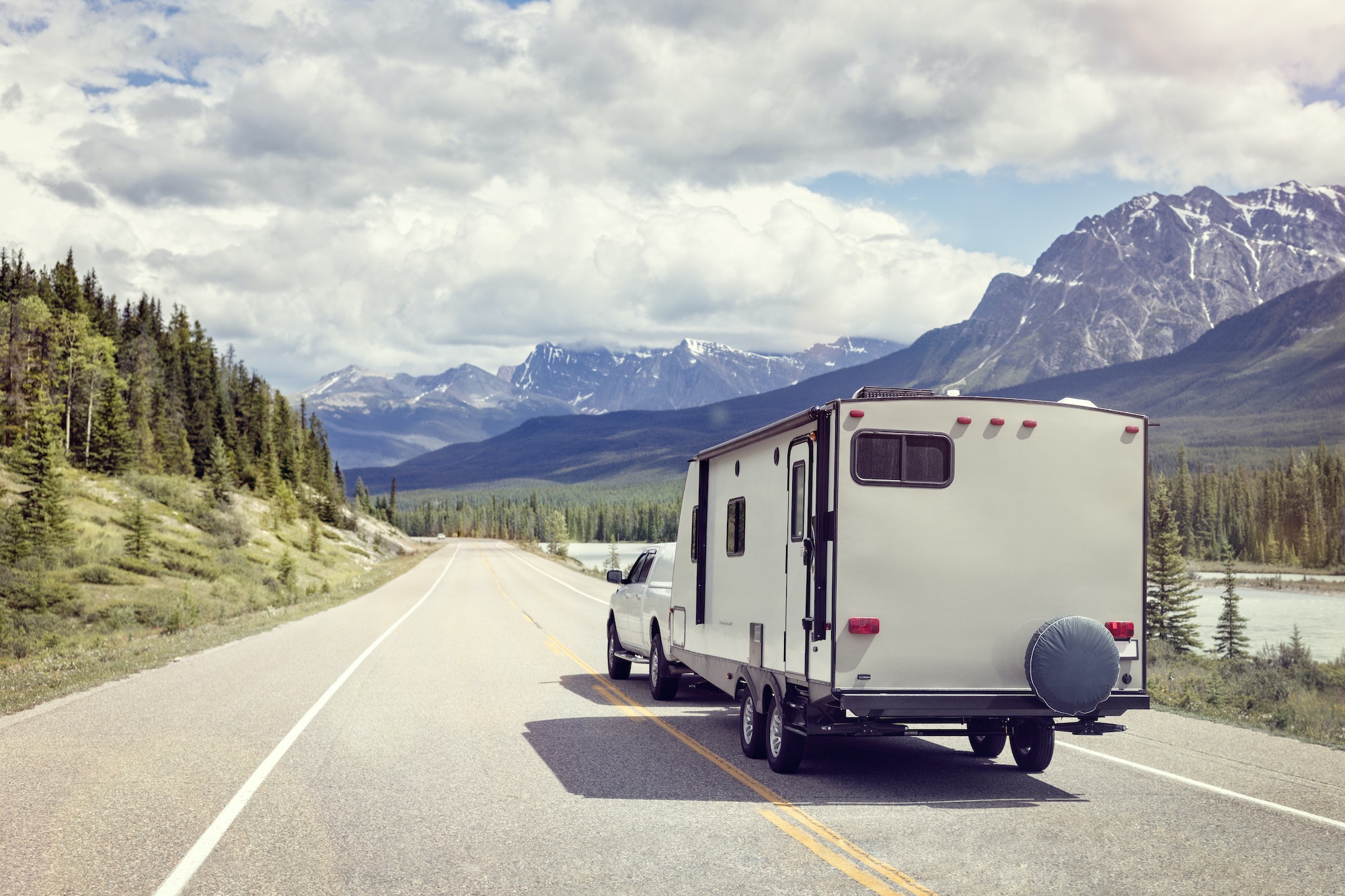 Caravan or motor home trailer on a mountain road